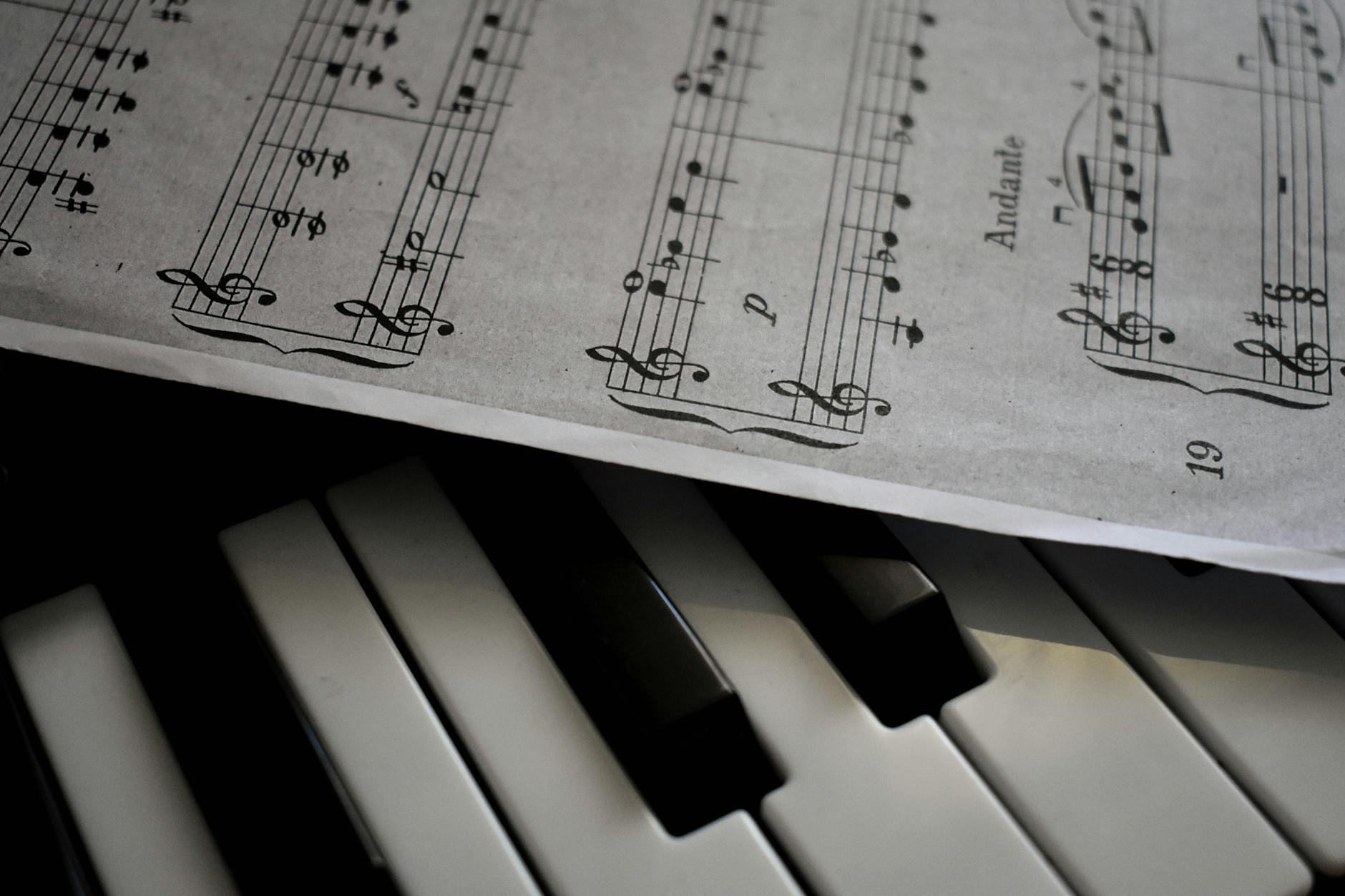 Sheet music on piano keys at Melodious Piano Studio